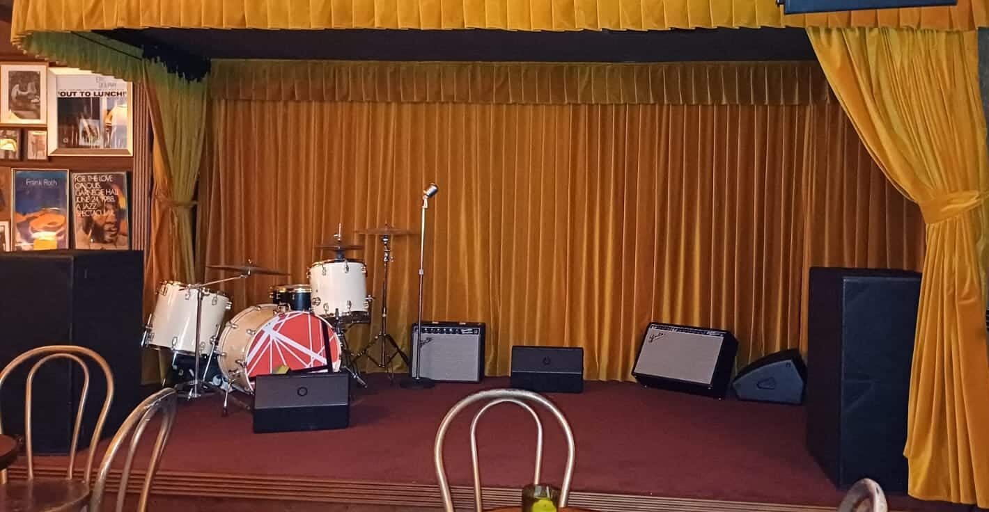 CaterPillarClub_custom stage drape and track_mustard velvet